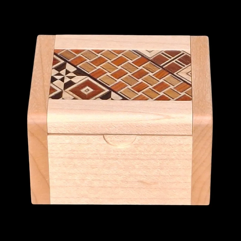 Karakuri Box: Fake Box – Front aerial view with Koyosegi marquetry top – Designer: KCG