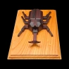 Karakuri-Box: Kabuto – Front aerial view of the rhinoceros beetle on its plinth – Designer: Taisho Iwasaki