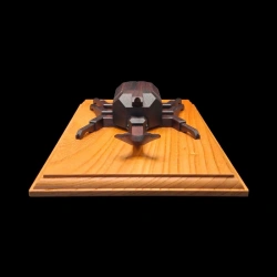 Karakuri-Box: Kabuto – Front view of the rhinoceros beetle on its plinth – Designer: Taisho Iwasaki