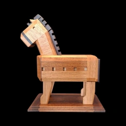 Karakuri box: A horse with a warrior - Side view of the horse with small openings carved into the flank - Creator: Osamu Kasho