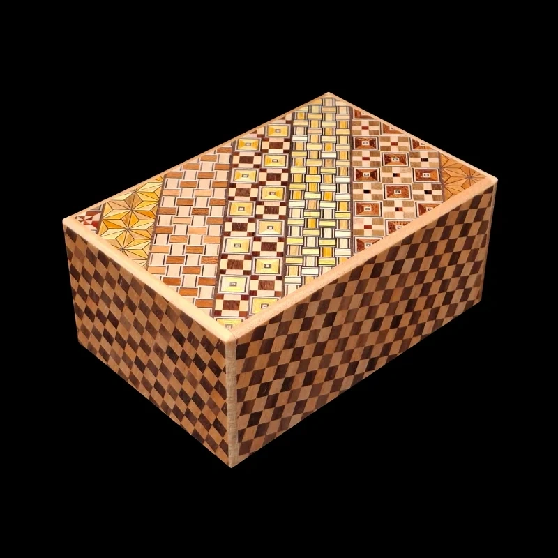 Himitsu-bako: 5 Sun 10 Steps with Drawer – Diagonal bird’s-eye view with Koyosegi patterns on the lid – Designer: Hiroyuki Oka