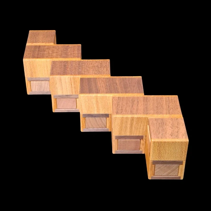 Karakuri Box: Fractal 9 Unit - Vista aérea de las 5 piezas interconectadas - Creador: Hiroshi Iwahara