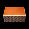 Himitsu-Bako: 4 Sun 14 Steps Yosegi & Ichimatsu – Top view of the walnut front – Designer: Hiroyuki Oka