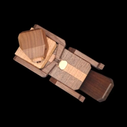 Karakuri Box: Hungry Sea Otter – Top view with a central wooden outline – Designer: Yasuaki Kikuchi