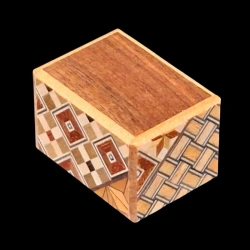 Himitsu-Bako: Mame 18 Steps ‘Hexagon’ – Diagonal aerial view of the dark wood back panel and koyosegi sides